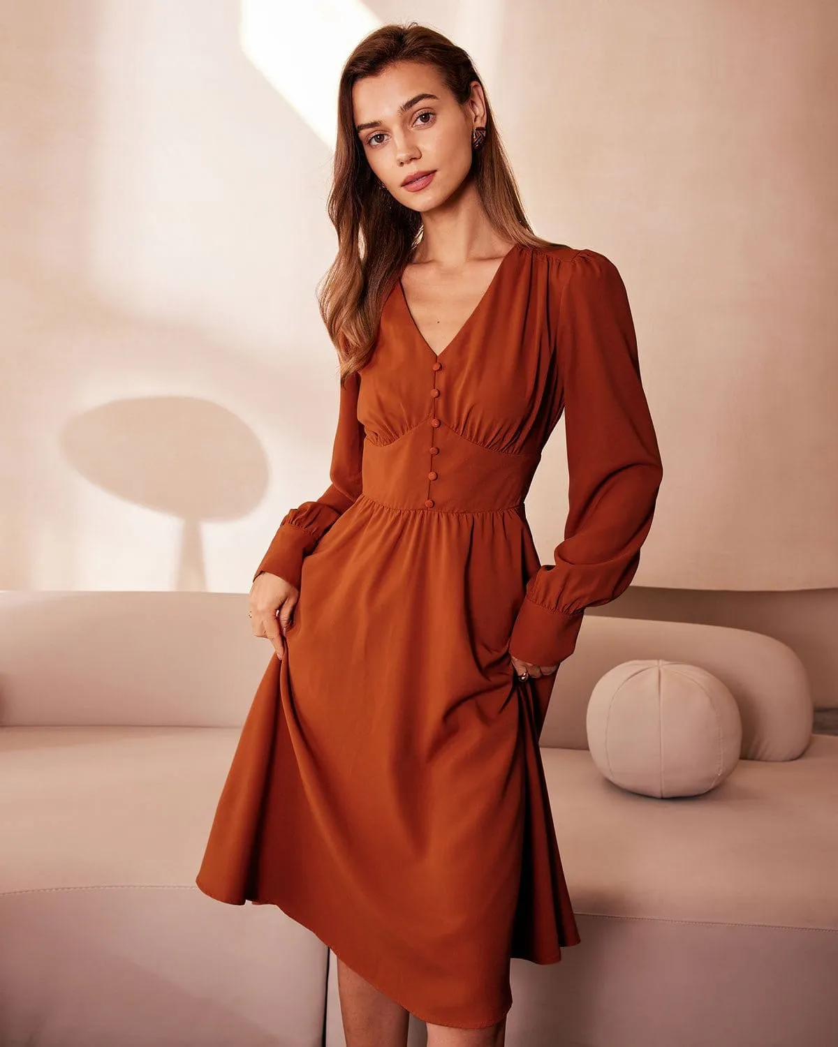 The Orange V Neck Pleated Button Midi Dress